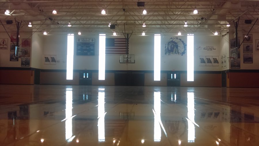Sun gleaming in through the windows, the gym at Holt High School awaits the basketball season.