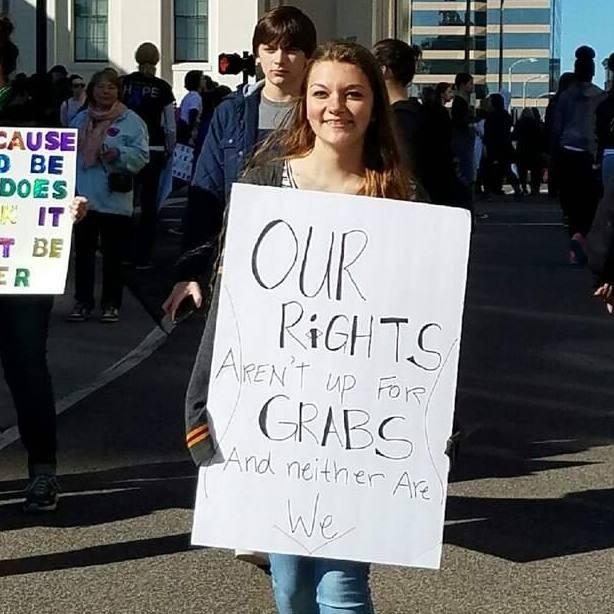 At the end of the march, Gillian Wagner (18) holds her sign up proud.