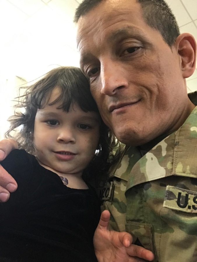 Officer Ricardo Amezcua and his 4-year old daughter Kayla are luckily safe from harm.