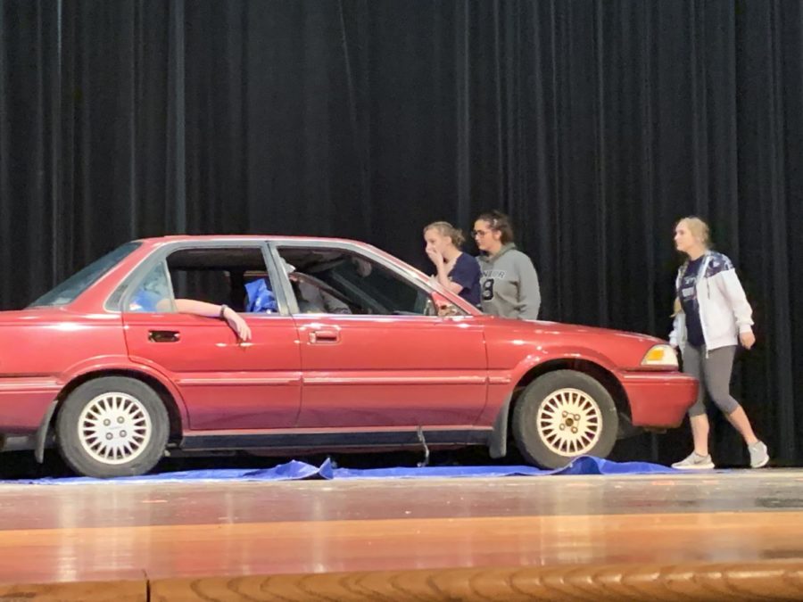 The demonstration to prevent students from making poor choices prom weekend simulates two students trapped in a car driven by another student who was drinking at a party. as their friends look on in horror.