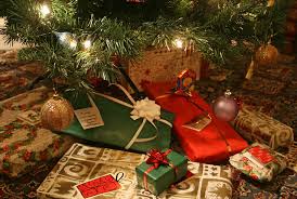 Presents under a tree for family members to open on christmas morning. 