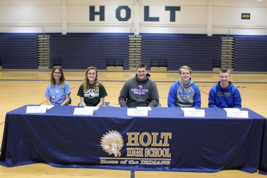 Five athletes at Holt prepare to sign for the next four years.