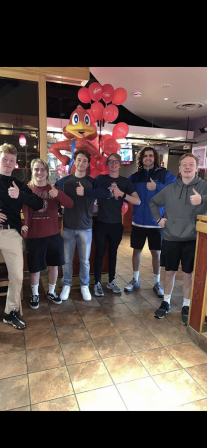 Kade Bickel (‘21) and Connor Dalton (‘21) pose for a picture with their friends at Red Robin. The two have been working so hard this year and really want to make a difference.
