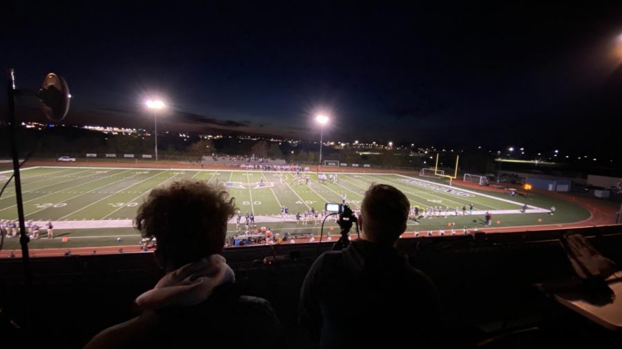 Aidan May (22) and Adian Kline (22) livestream the game.