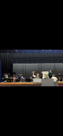 The cast and crew work hard during rehearsal. Preparing for the upcoming March show. 